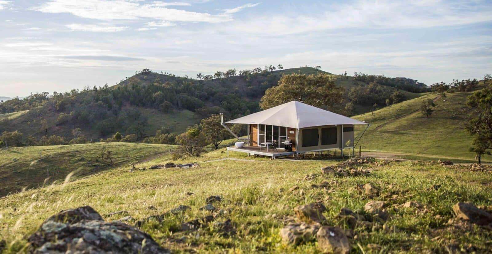Safari tent set lightly in the landscape at Sierra Escape eco retreat, Mudgee
